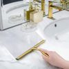 Kylpyhuoneen puristin Brush Gold