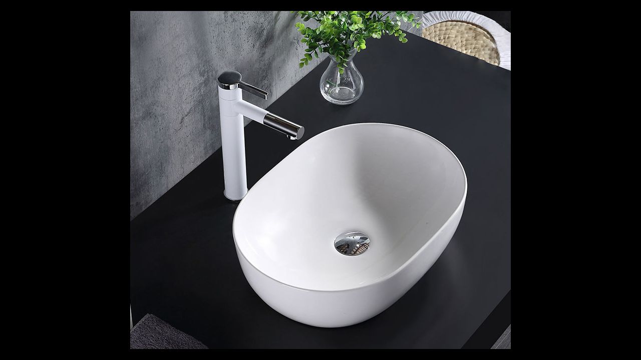 Lavabo sobre encimera Baño ovalado Diseño italiano en cerámica