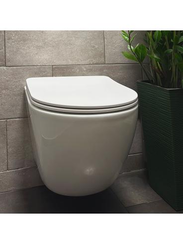 тоалетна чиния Rea Carlo Mini Tornado Rimless Flat N