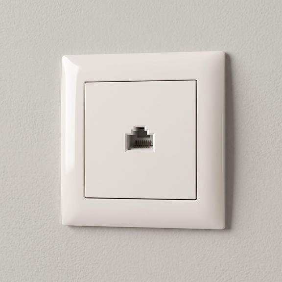 Gniazdo RJ45 z ramką OSTE JNH010-S Beżowe